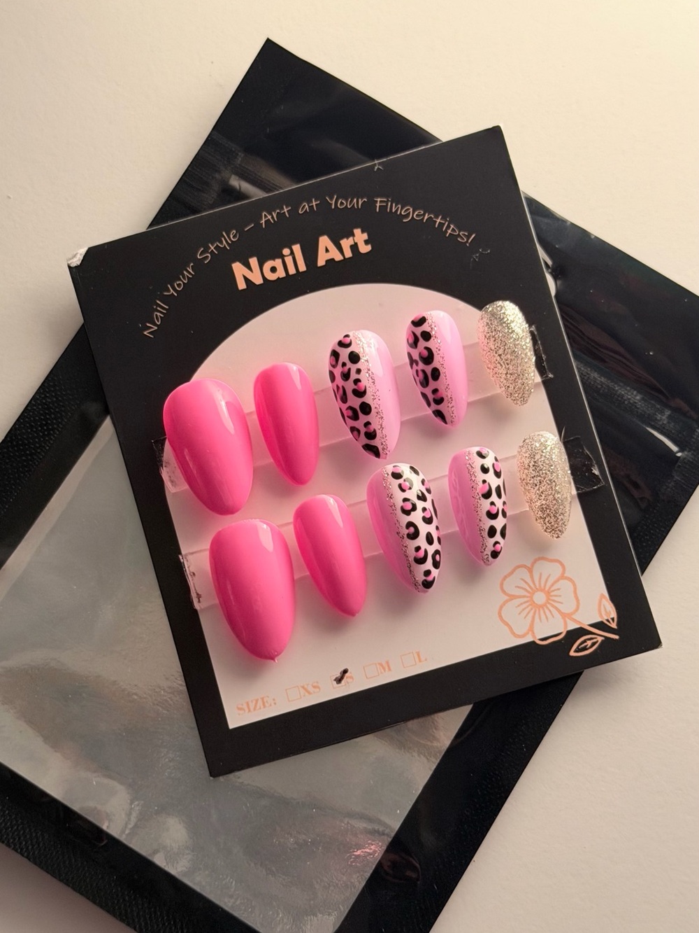 Hot pink cheetah print nails with glitter